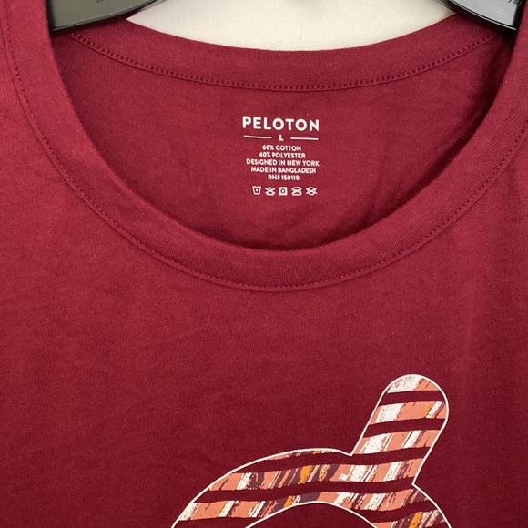 NWT. Peloton studio side slit muscle tank. - Picture 2 of 4